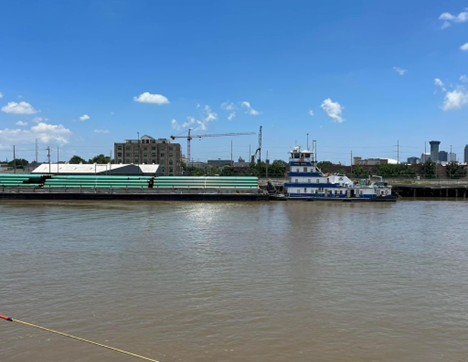 Barge towing coiled pipe